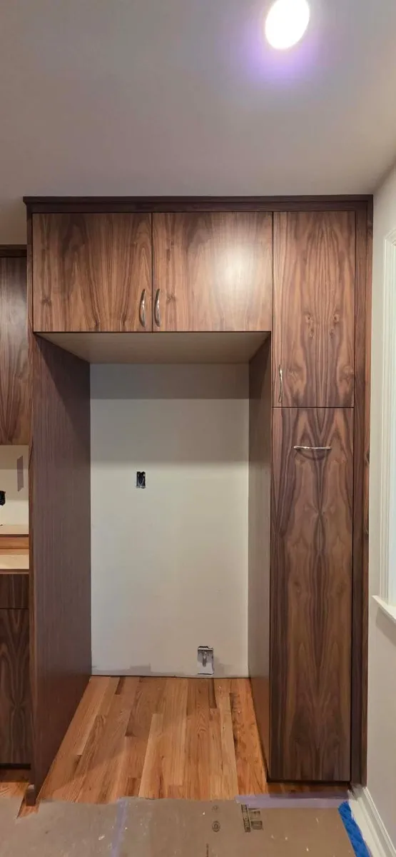 Custom walnut cabinetry by All Custom Building