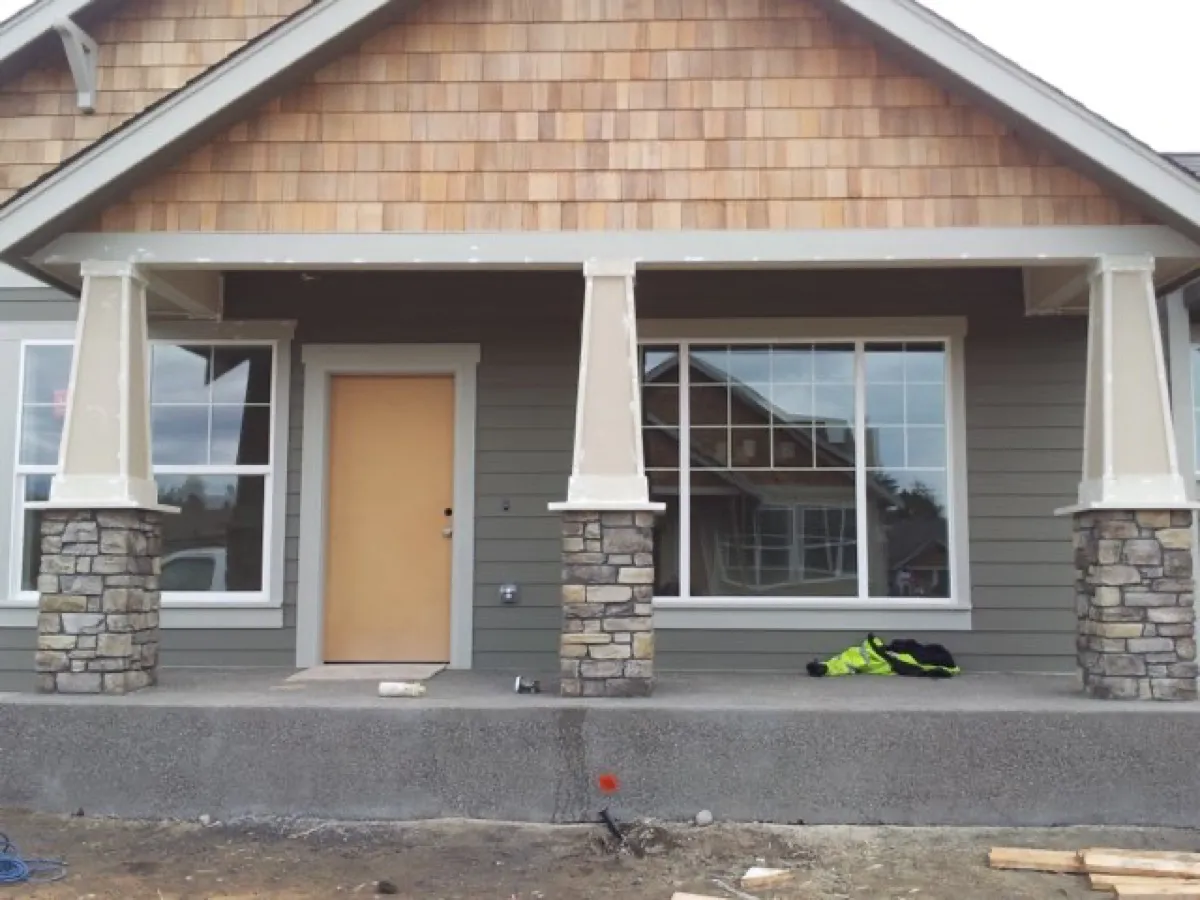 New custom home by All Custom Building — craftsman with stone columns