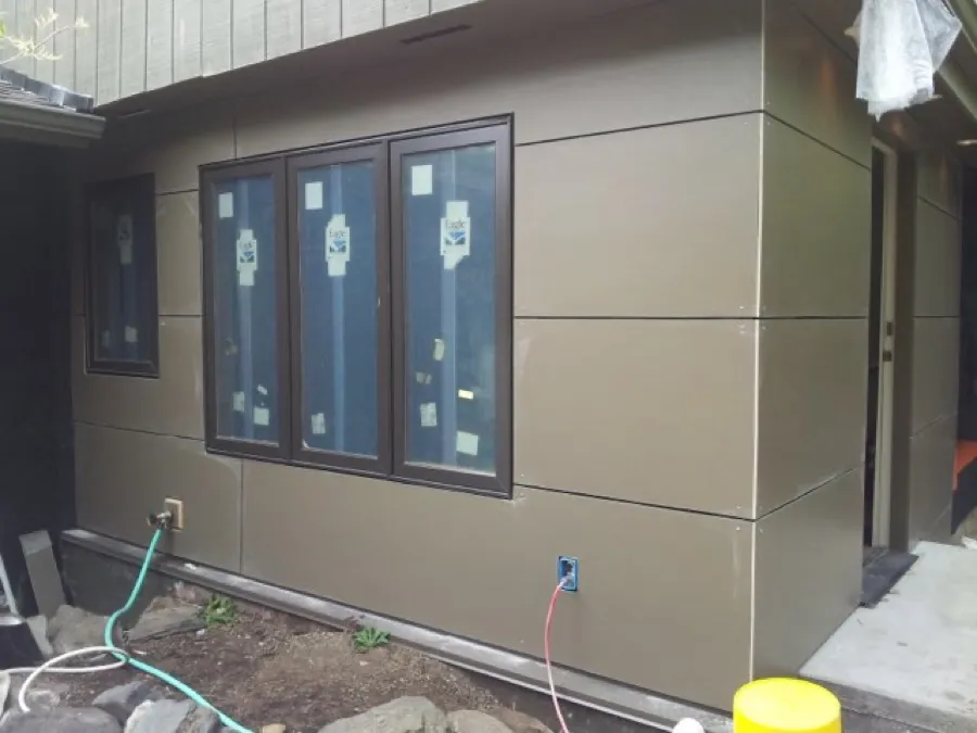 Panel siding and window installation