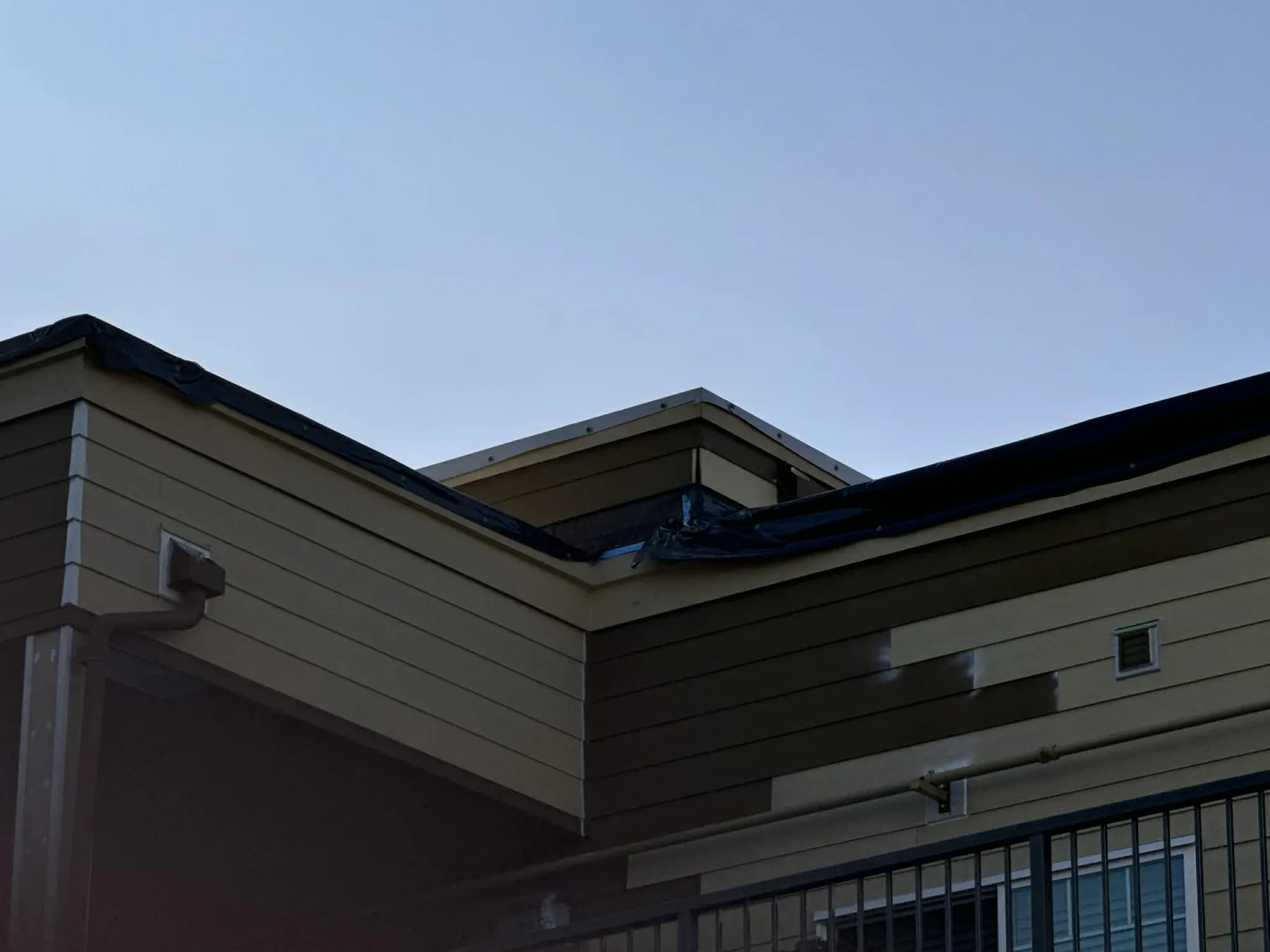 Worker on Rooftop — Safety Vest